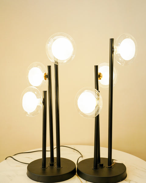 Modern black triple rod lamp pair