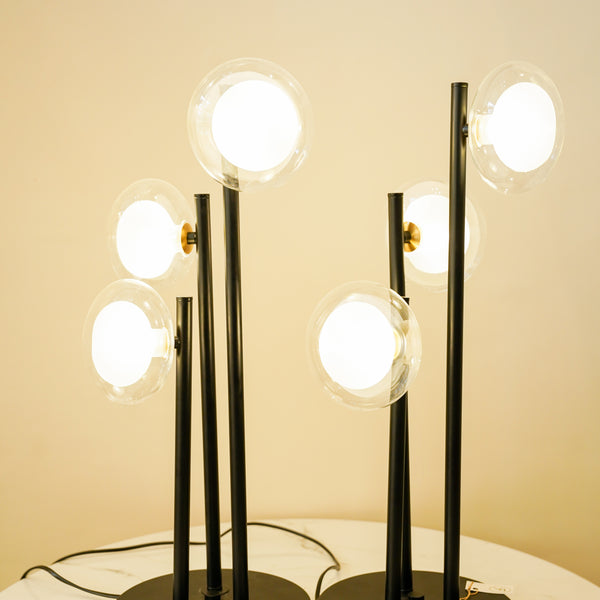 Modern black triple rod lamp pair