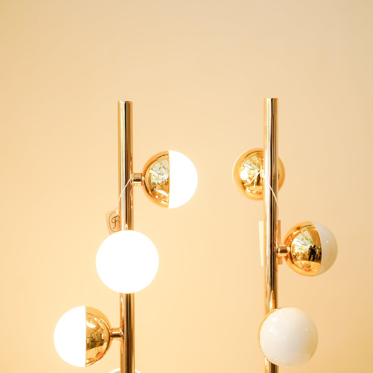 Modern black triple rod lamp pair