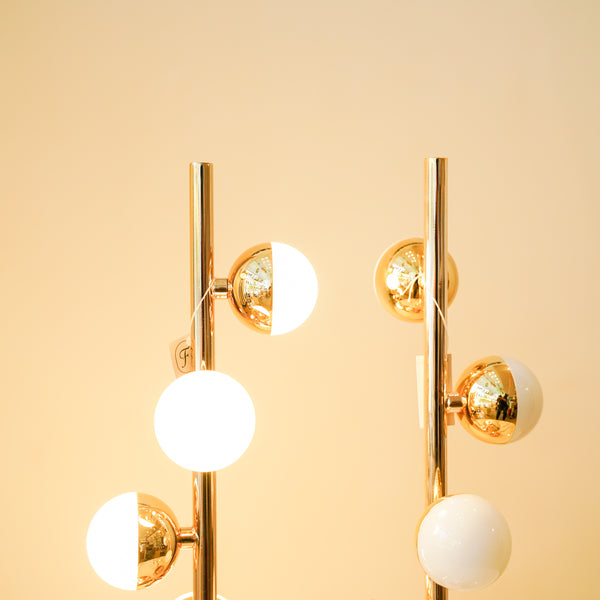 Modern black triple rod lamp pair