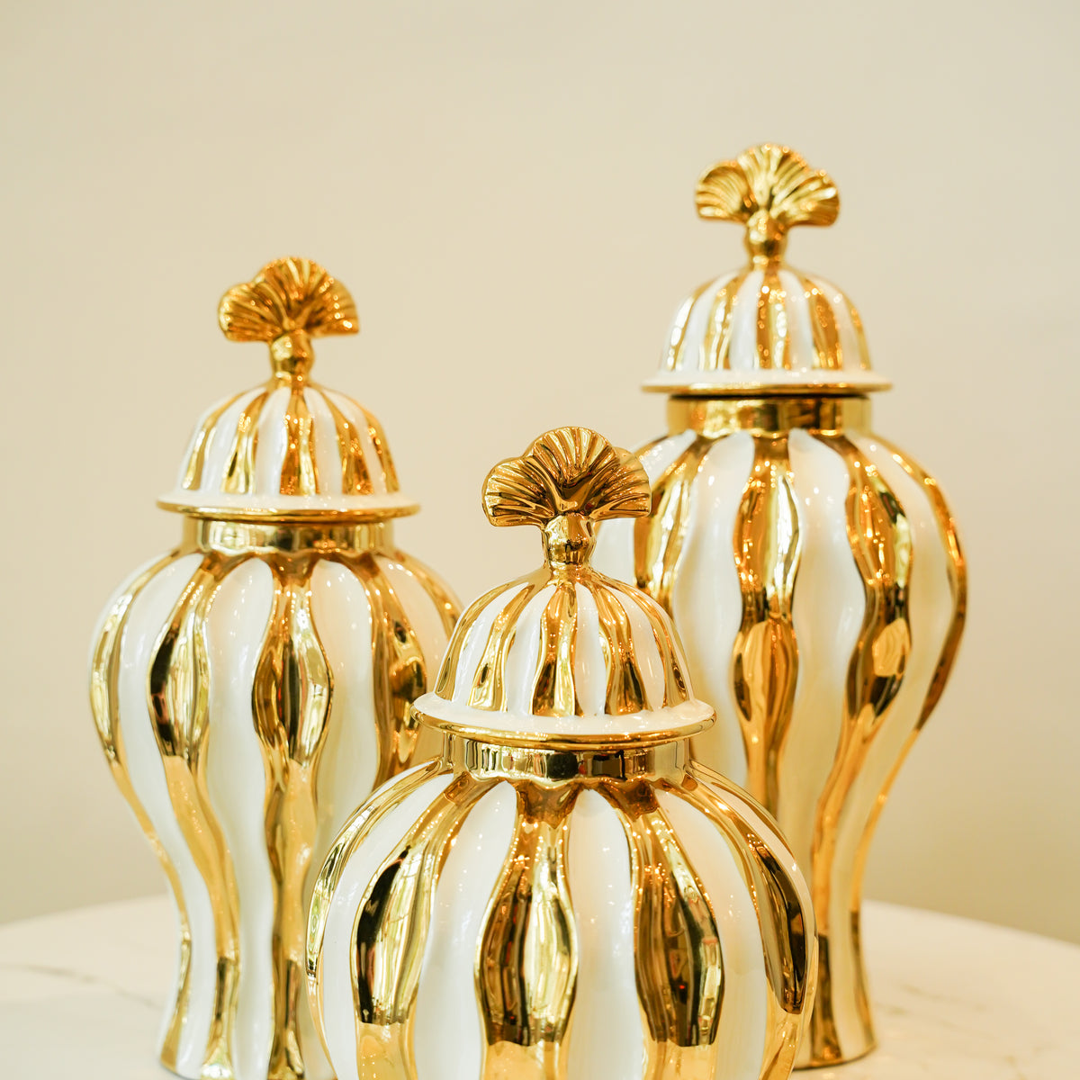 Gold and white candy jar set