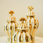 Gold and white candy jar set