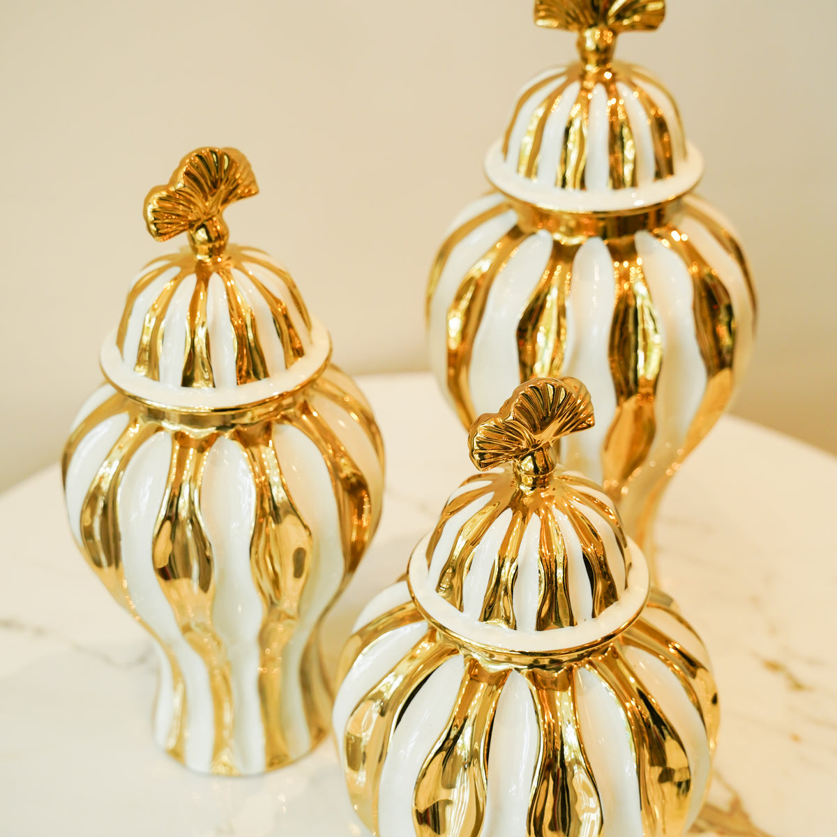 Gold and white candy jar set