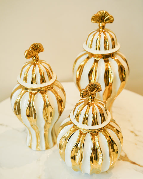 Gold and white candy jar set
