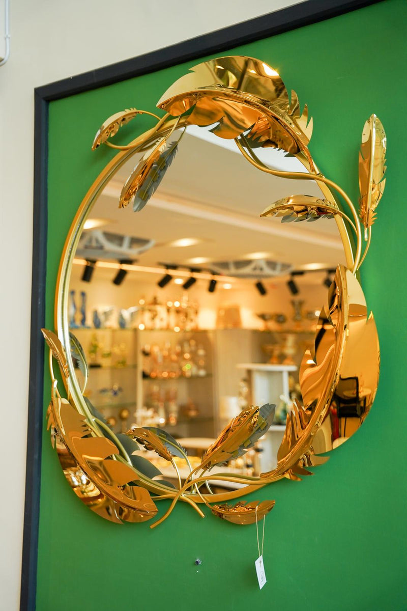 Round mirror golden leaves