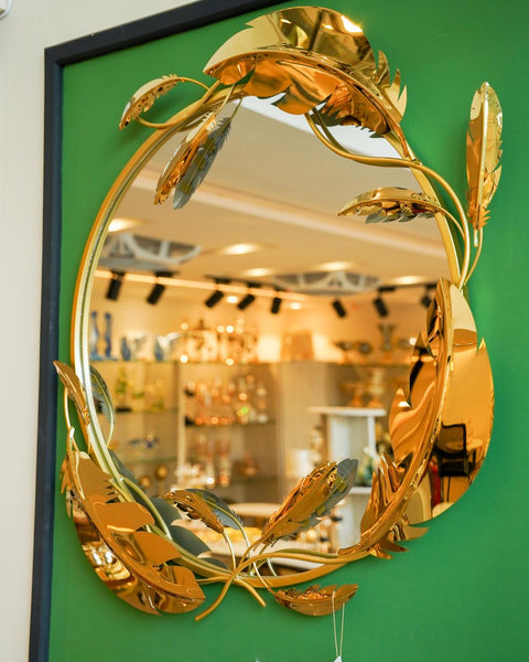 Round mirror golden leaves