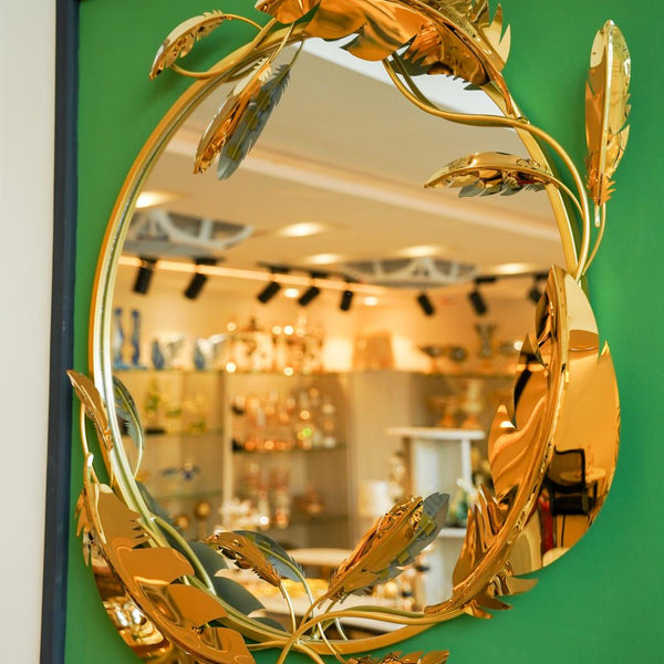 Round mirror golden leaves