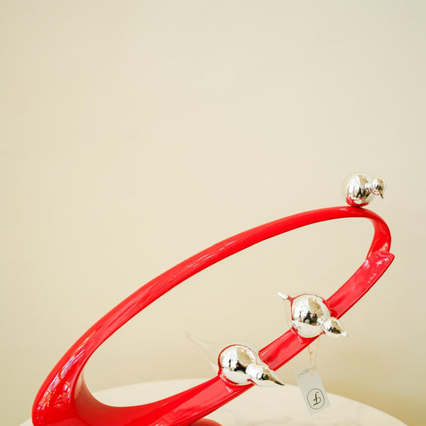 Red Orbit with silver birds