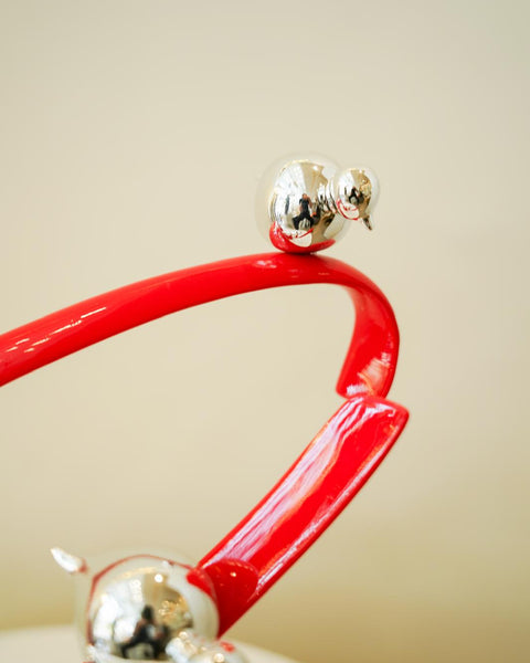 Red Orbit with silver birds
