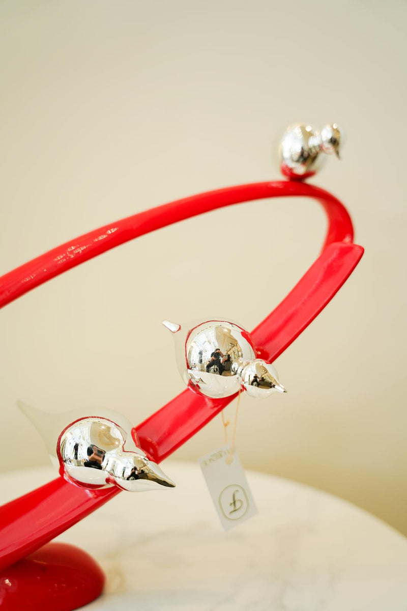 Red Orbit with silver birds