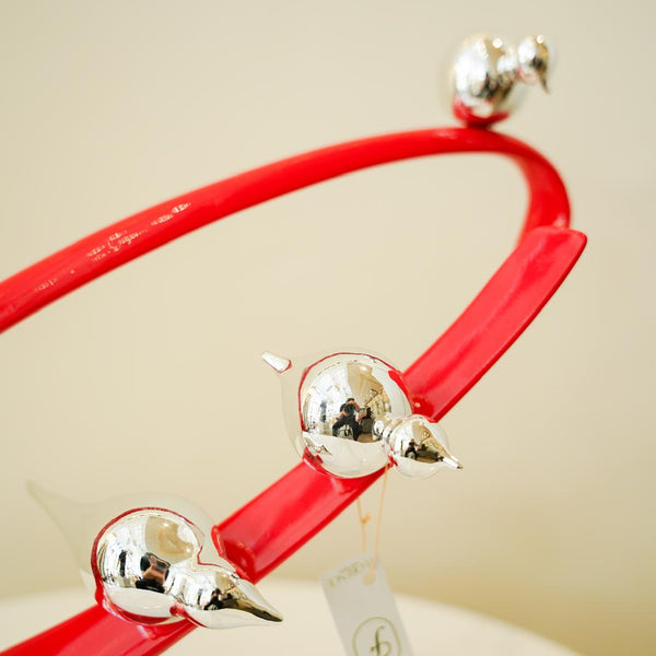 Red Orbit with silver birds