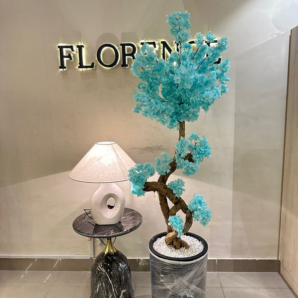 light blue blossom tree with black grp