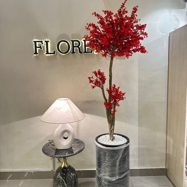 Red blossom tree with black grp